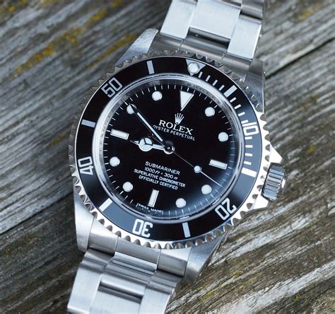 how to spot a fake rolex submariner 14060|rolex 14060m production years.